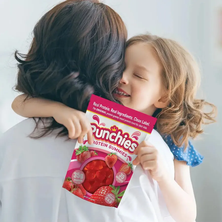 Growth gummies: a parent hugging a child with a bag of Punchies protein gummies